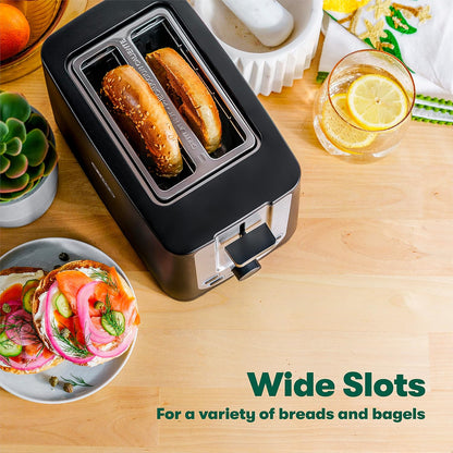 BELLA 2 Slice Toaster. With its extra wide slots and removable crumb tray, it's perfect for busy mornings. Say goodbye to burnt toast and hello to perfectly toasted goodness.